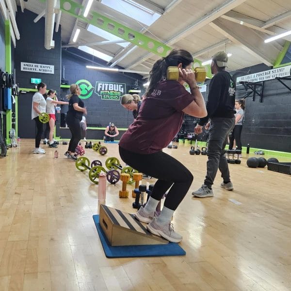 Womans with dumbells at Fitbug Fitness Studio